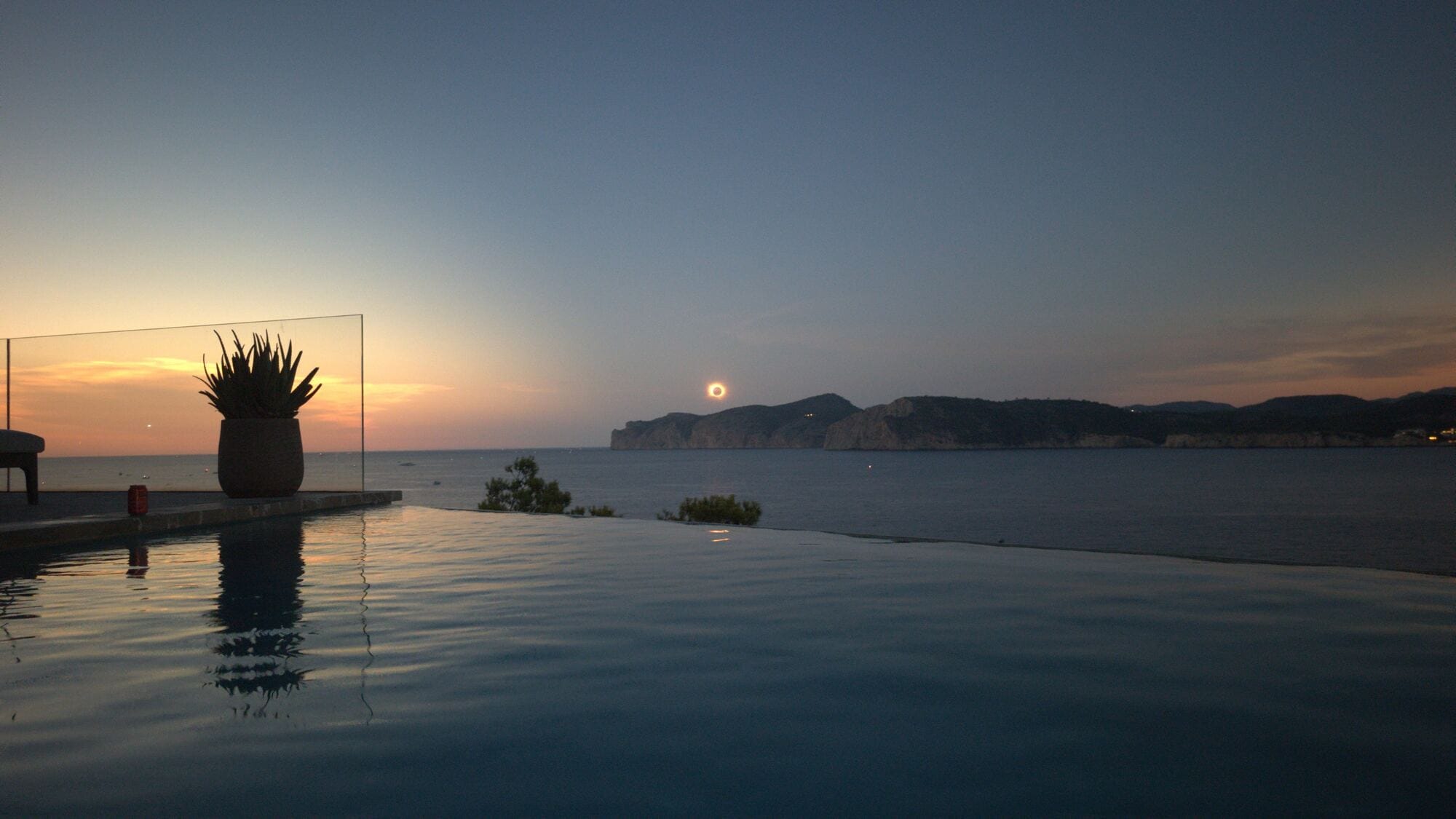The ring of fire eclipse over the bay, taken from the villa's infinity pool